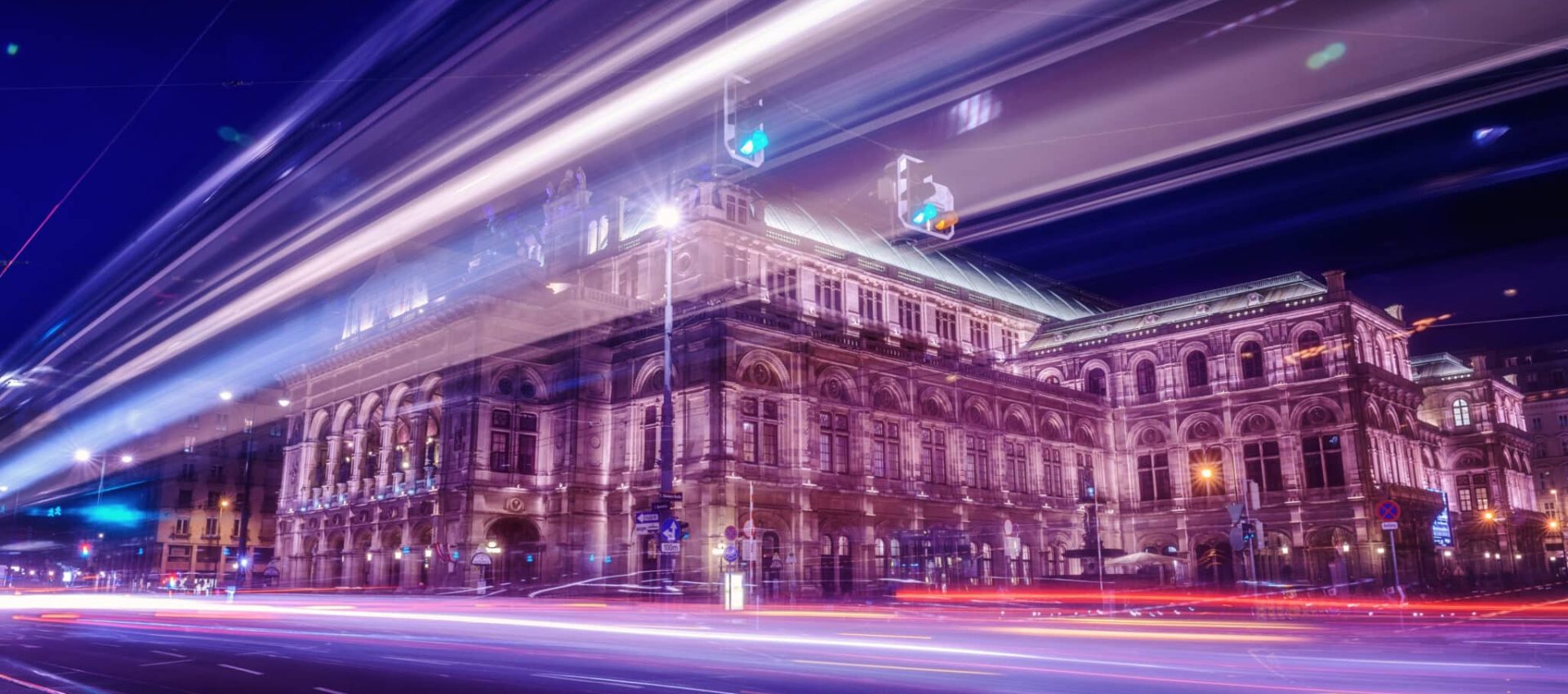 Long exposure of traffic lights and the beautiful building in Vienna city center